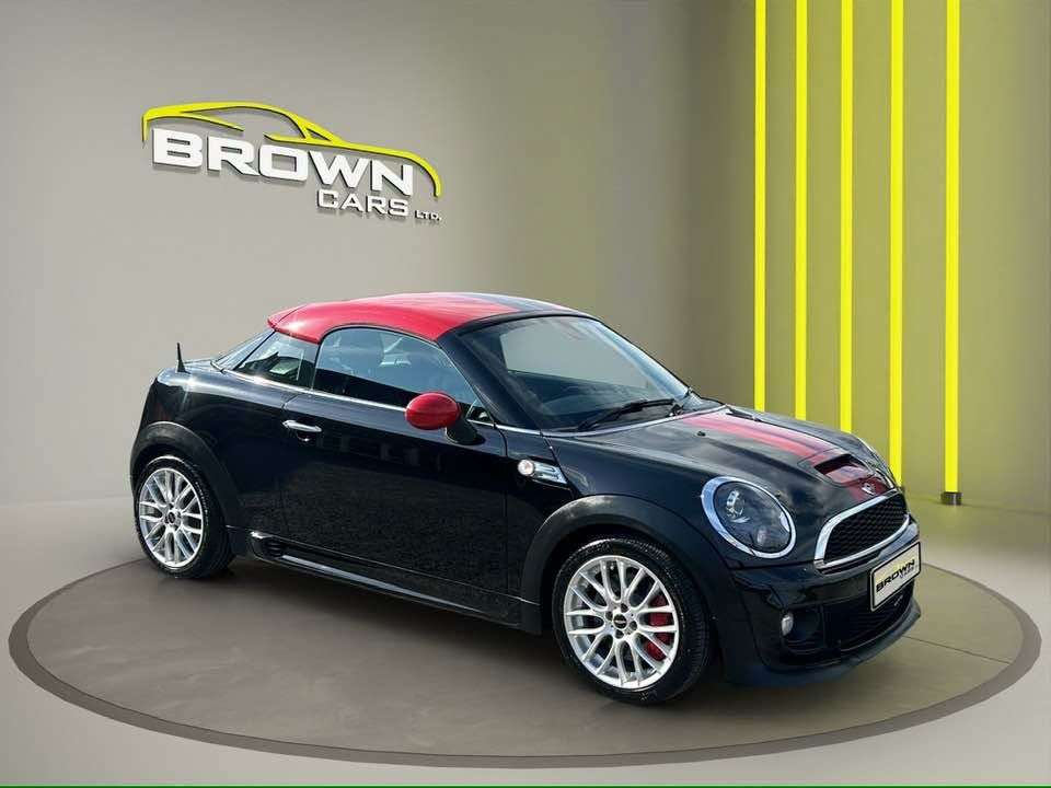 A 2015 MINI COUPE 1.6 John Cooper Works Coupe 2dr Petrol Manual Euro 5 (s/s) (211 ps) A 2015 MINI COUPE 1.6 John Cooper Works Coupe 2dr Petrol Manual Euro 5 (s/s) (211 ps)