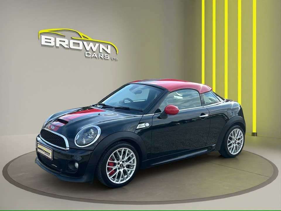 A 2015 MINI COUPE 1.6 John Cooper Works Coupe 2dr Petrol Manual Euro 5 (s/s) (211 ps) A 2015 MINI COUPE 1.6 John Cooper Works Coupe 2dr Petrol Manual Euro 5 (s/s) (211 ps)