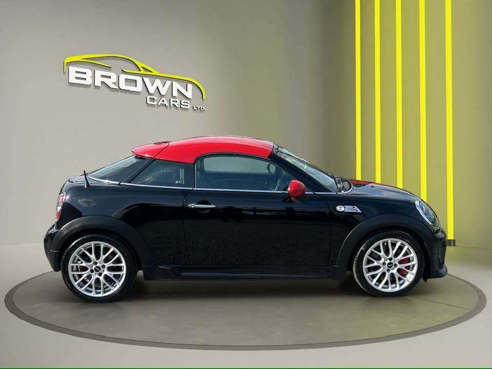 A 2015 MINI COUPE 1.6 John Cooper Works Coupe 2dr Petrol Manual Euro 5 (s/s) (211 ps) A 2015 MINI COUPE 1.6 John Cooper Works Coupe 2dr Petrol Manual Euro 5 (s/s) (211 ps)