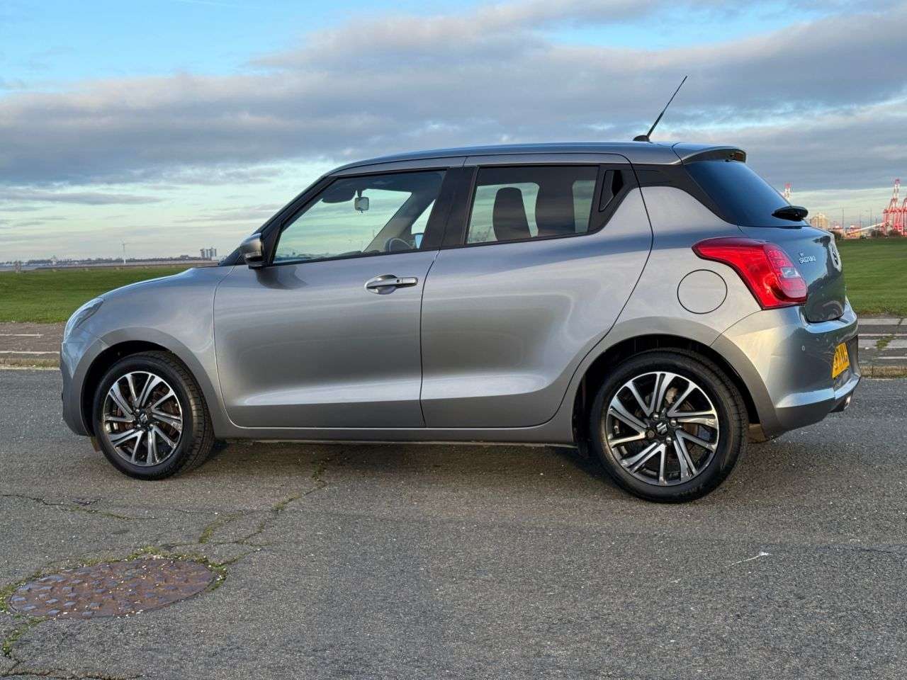 A 2022 SUZUKI SWIFT 1.2 Dualjet MHEV SZ5 Hatchback 5dr Petrol Hybrid CVT Euro 6 (s/s) (83 ps) A 2022 SUZUKI SWIFT 1.2 Dualjet MHEV SZ5 Hatchback 5dr Petrol Hybrid CVT Euro 6 (s/s) (83 ps)