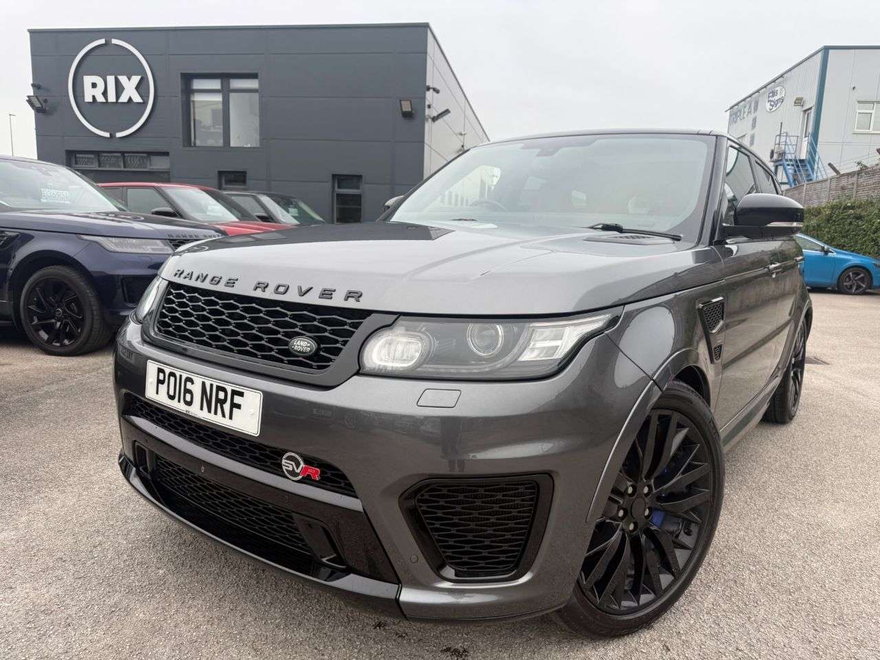 A 2016 LAND ROVER RANGE ROVER SPORT SVR 5.0L FINISHED IN CORRIS GREY WITH TWO TONE RED AND BLACK LEATHER BUCKET A 2016 LAND ROVER RANGE ROVER SPORT SVR 5.0L FINISHED IN CORRIS GREY WITH TWO TONE RED AND BLACK LEATHER BUCKET
