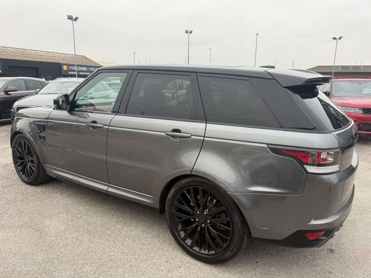 A 2016 LAND ROVER RANGE ROVER SPORT SVR 5.0L FINISHED IN CORRIS GREY WITH TWO TONE RED AND BLACK LEATHER BUCKET A 2016 LAND ROVER RANGE ROVER SPORT SVR 5.0L FINISHED IN CORRIS GREY WITH TWO TONE RED AND BLACK LEATHER BUCKET