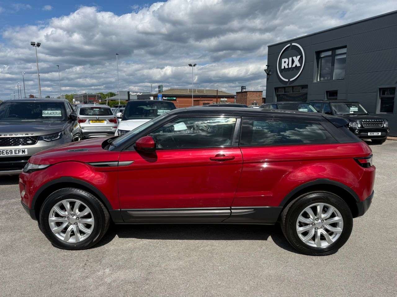 A 2014 LAND ROVER RANGE ROVER EVOQUE 2.2 SD4 Pure Tech Coupe 3dr Diesel Auto 4WD-FINISHED IN FIRENZE RED WITH BL A 2014 LAND ROVER RANGE ROVER EVOQUE 2.2 SD4 Pure Tech Coupe 3dr Diesel Auto 4WD-FINISHED IN FIRENZE RED WITH BL