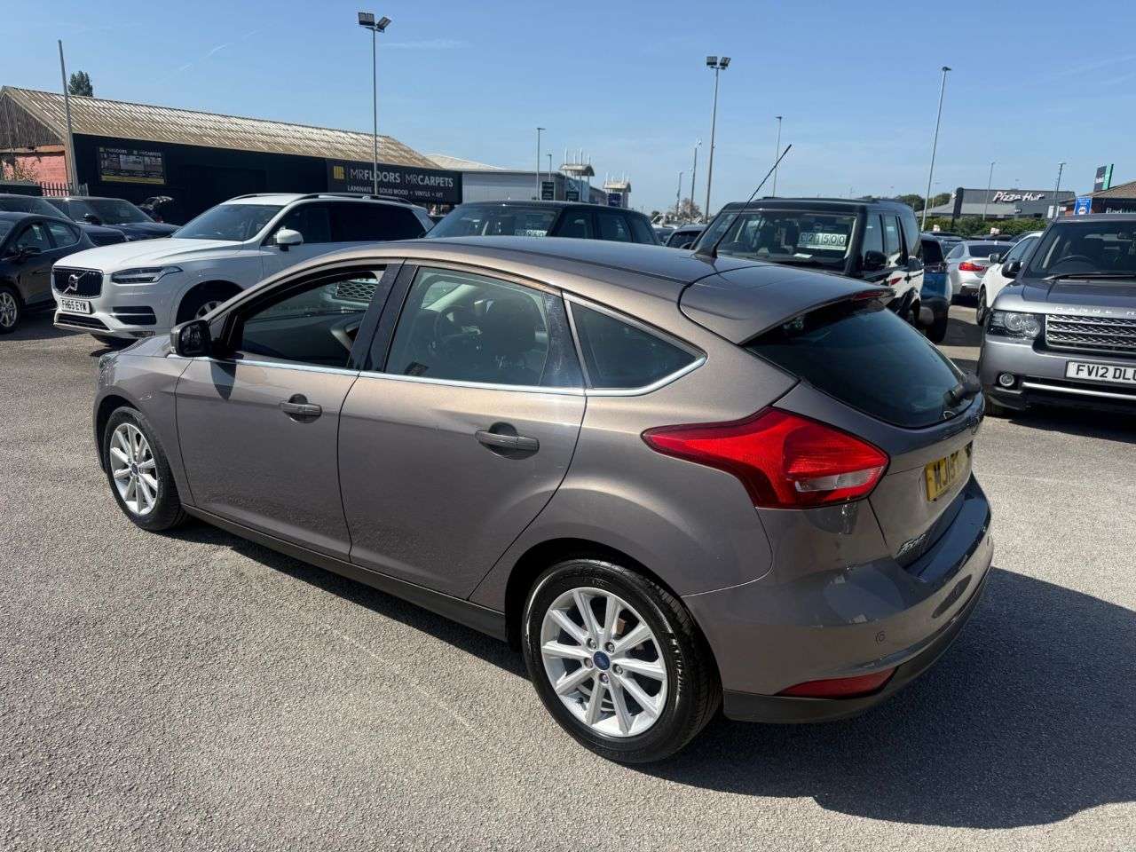 A 2015 FORD FOCUS 1.6 TDCi Titanium Hatchback 5dr Diesel Manual Euro 5 (s/s) (115 ps) A 2015 FORD FOCUS 1.6 TDCi Titanium Hatchback 5dr Diesel Manual Euro 5 (s/s) (115 ps)