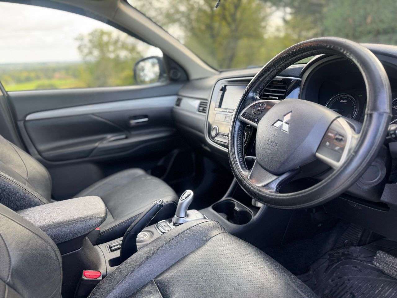 A 2015 MITSUBISHI OUTLANDER 2.0h 12kWh GX4h SUV 5dr Petrol Plug-in Hybrid CVT 4WD Euro 5 (s/s) (200 ps) A 2015 MITSUBISHI OUTLANDER 2.0h 12kWh GX4h SUV 5dr Petrol Plug-in Hybrid CVT 4WD Euro 5 (s/s) (200 ps)