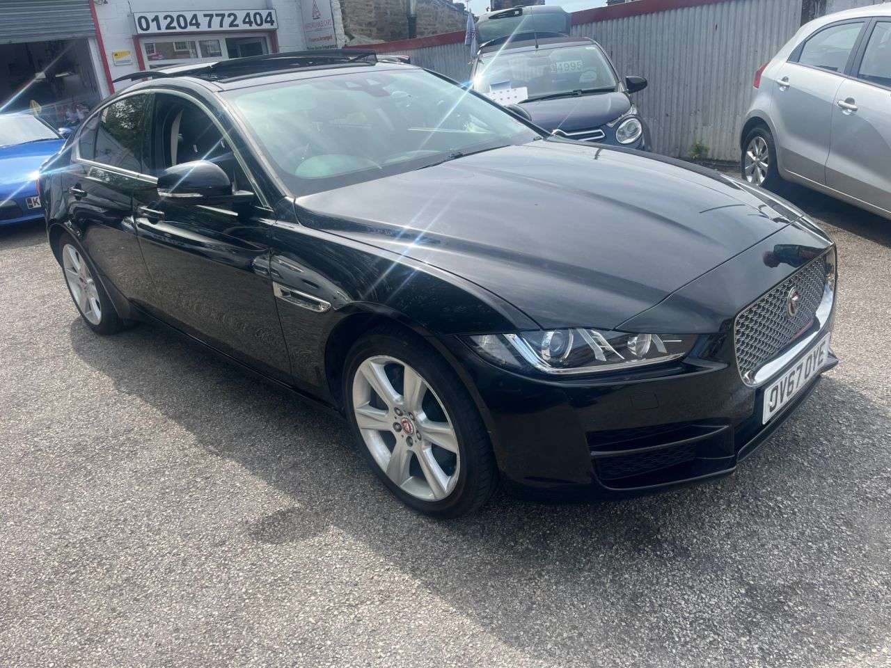 A 2017 JAGUAR XE 2.0d Portfolio Saloon 4dr Diesel Auto AWD Euro 6 (s/s) (180 ps) A 2017 JAGUAR XE 2.0d Portfolio Saloon 4dr Diesel Auto AWD Euro 6 (s/s) (180 ps)