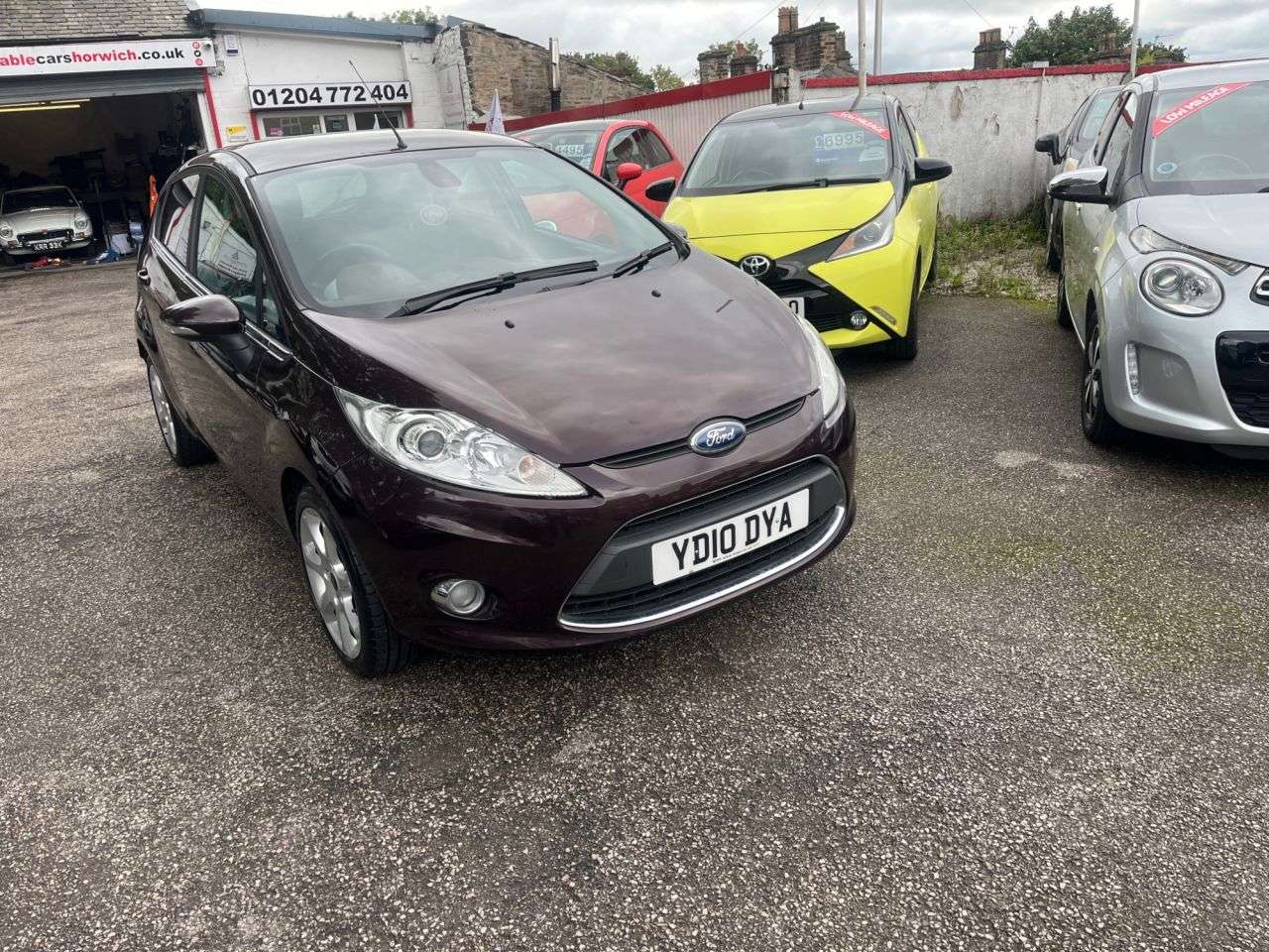 A 2010 FORD FIESTA 1.4 Titanium Hatchback 5dr Petrol Manual (133 g/km, 94 bhp) A 2010 FORD FIESTA 1.4 Titanium Hatchback 5dr Petrol Manual (133 g/km, 94 bhp)