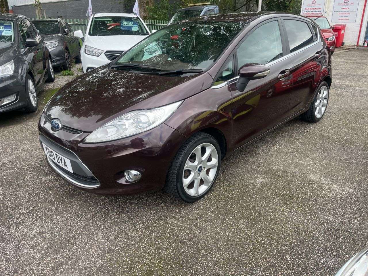 A 2010 FORD FIESTA 1.4 Titanium Hatchback 5dr Petrol Manual (133 g/km, 94 bhp) A 2010 FORD FIESTA 1.4 Titanium Hatchback 5dr Petrol Manual (133 g/km, 94 bhp)