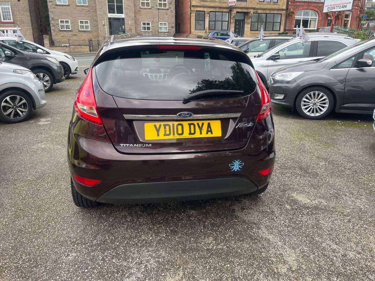 A 2010 FORD FIESTA 1.4 Titanium Hatchback 5dr Petrol Manual (133 g/km, 94 bhp) A 2010 FORD FIESTA 1.4 Titanium Hatchback 5dr Petrol Manual (133 g/km, 94 bhp)