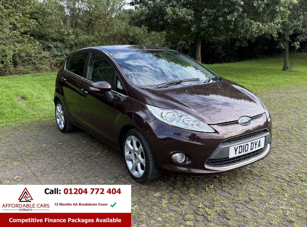 A 2010 FORD FIESTA 1.4 Titanium Hatchback 5dr Petrol Manual (133 g/km, 94 bhp) A 2010 FORD FIESTA 1.4 Titanium Hatchback 5dr Petrol Manual (133 g/km, 94 bhp)