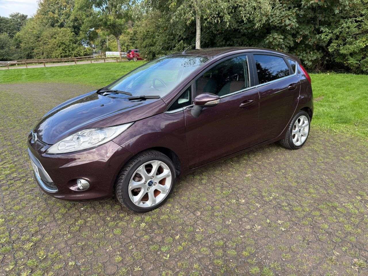 A 2010 FORD FIESTA 1.4 Titanium Hatchback 5dr Petrol Manual (133 g/km, 94 bhp) A 2010 FORD FIESTA 1.4 Titanium Hatchback 5dr Petrol Manual (133 g/km, 94 bhp)