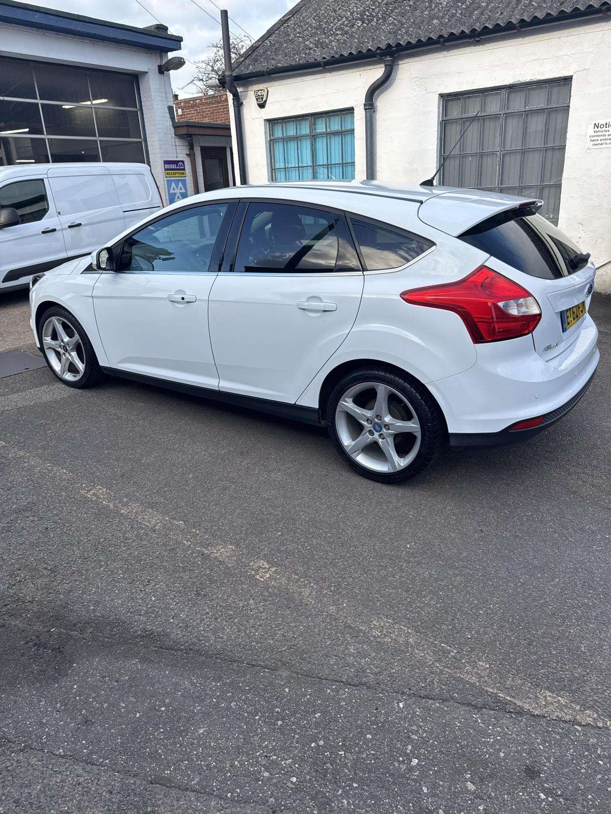 A 2013 FORD FOCUS 1.0T EcoBoost Titanium Hatchback 5dr Petrol Manual Euro 5 (s/s) (125 ps) A 2013 FORD FOCUS 1.0T EcoBoost Titanium Hatchback 5dr Petrol Manual Euro 5 (s/s) (125 ps)