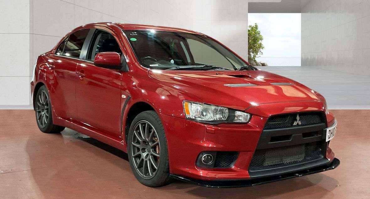 A 2011 MITSUBISHI LANCER 2.0T EVO X GSR FQ-300 Saloon 4dr Petrol SST 4WD Euro 4 (290 ps) A 2011 MITSUBISHI LANCER 2.0T EVO X GSR FQ-300 Saloon 4dr Petrol SST 4WD Euro 4 (290 ps)
