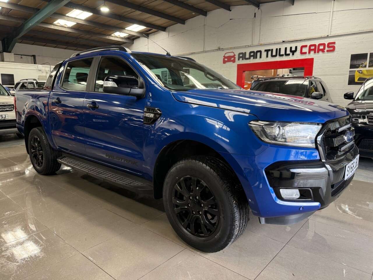A 2018 FORD RANGER 3.2 TDCi Wildtrak Pickup Double Cab 4dr Diesel Auto 4WD Euro 5 (200 ps) A 2018 FORD RANGER 3.2 TDCi Wildtrak Pickup Double Cab 4dr Diesel Auto 4WD Euro 5 (200 ps)