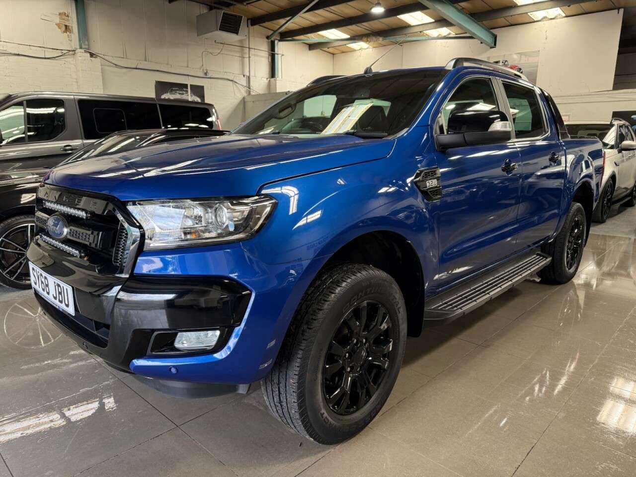 A 2018 FORD RANGER 3.2 TDCi Wildtrak Pickup Double Cab 4dr Diesel Auto 4WD Euro 5 (200 ps) A 2018 FORD RANGER 3.2 TDCi Wildtrak Pickup Double Cab 4dr Diesel Auto 4WD Euro 5 (200 ps)