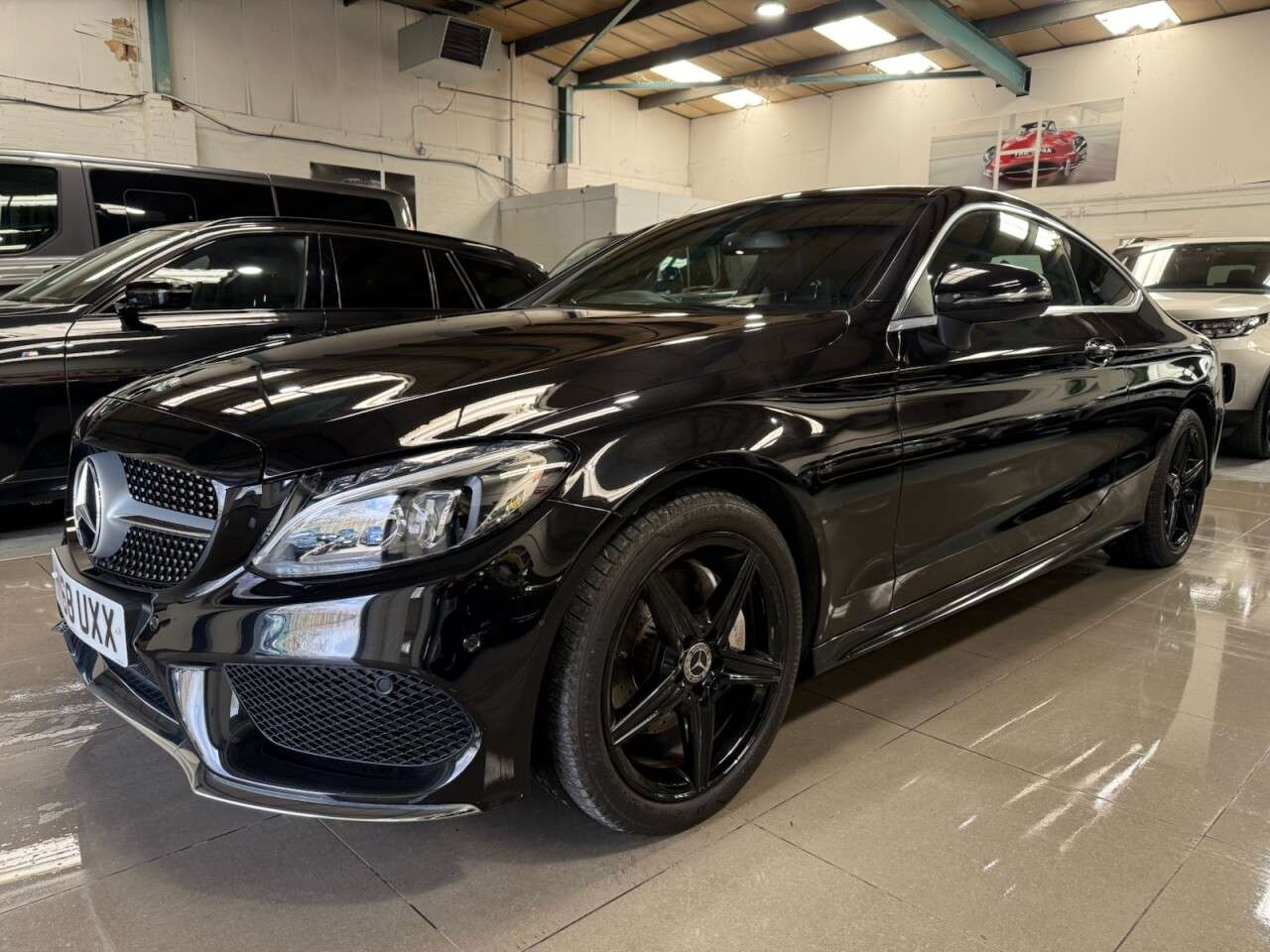 A 2018 MERCEDES-BENZ C-CLASS 2.0 C200 AMG Line (Premium) Coupe 2dr Petrol G-Tronic+ Euro 6 (s/s) (184 ps A 2018 MERCEDES-BENZ C-CLASS 2.0 C200 AMG Line (Premium) Coupe 2dr Petrol G-Tronic+ Euro 6 (s/s) (184 ps