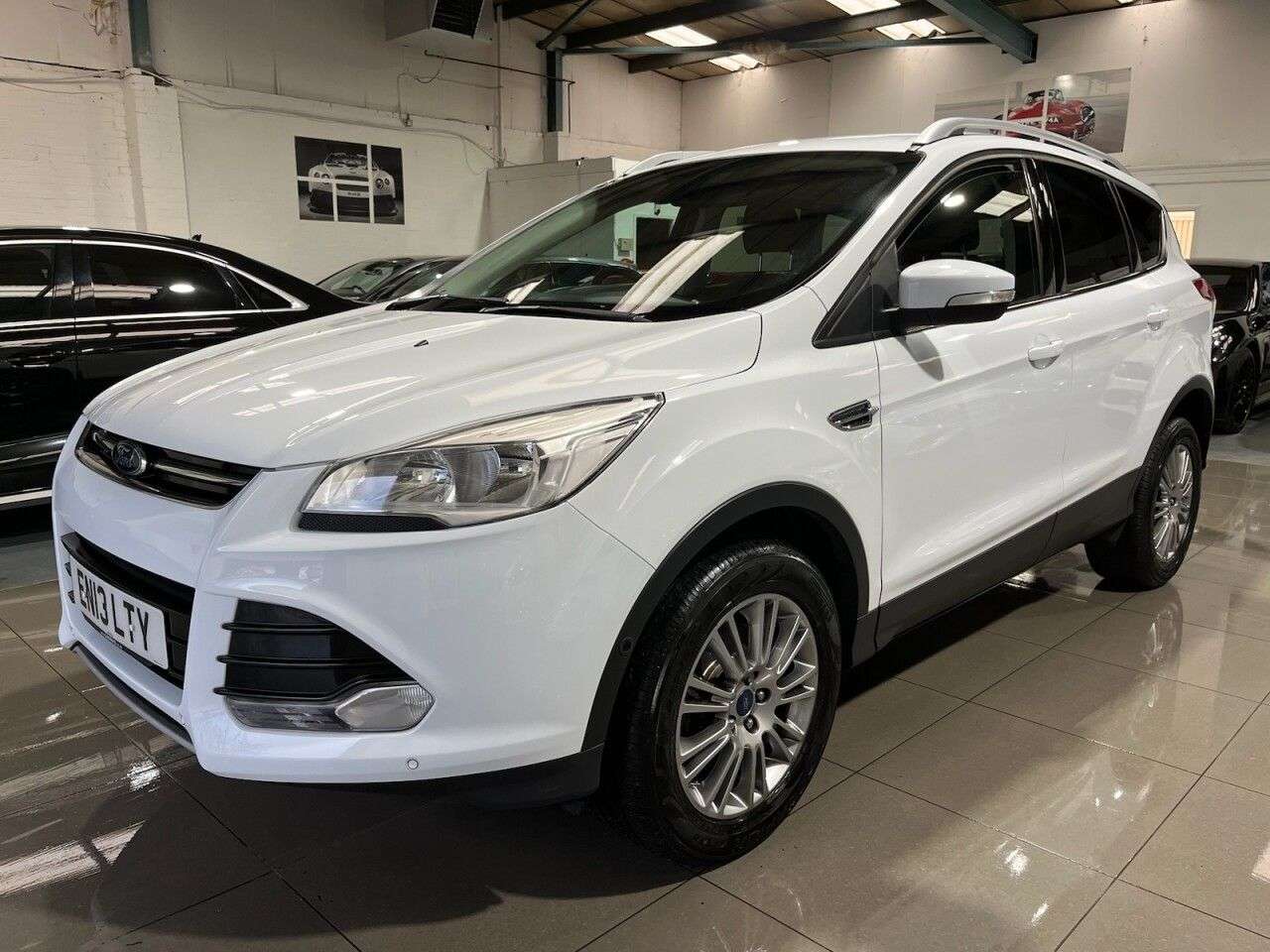A 2013 FORD KUGA 2.0 TDCi Titanium SUV 5dr Diesel Manual AWD Euro 5 (163 ps) A 2013 FORD KUGA 2.0 TDCi Titanium SUV 5dr Diesel Manual AWD Euro 5 (163 ps)