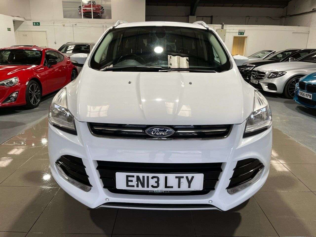 A 2013 FORD KUGA 2.0 TDCi Titanium SUV 5dr Diesel Manual AWD Euro 5 (163 ps) A 2013 FORD KUGA 2.0 TDCi Titanium SUV 5dr Diesel Manual AWD Euro 5 (163 ps)