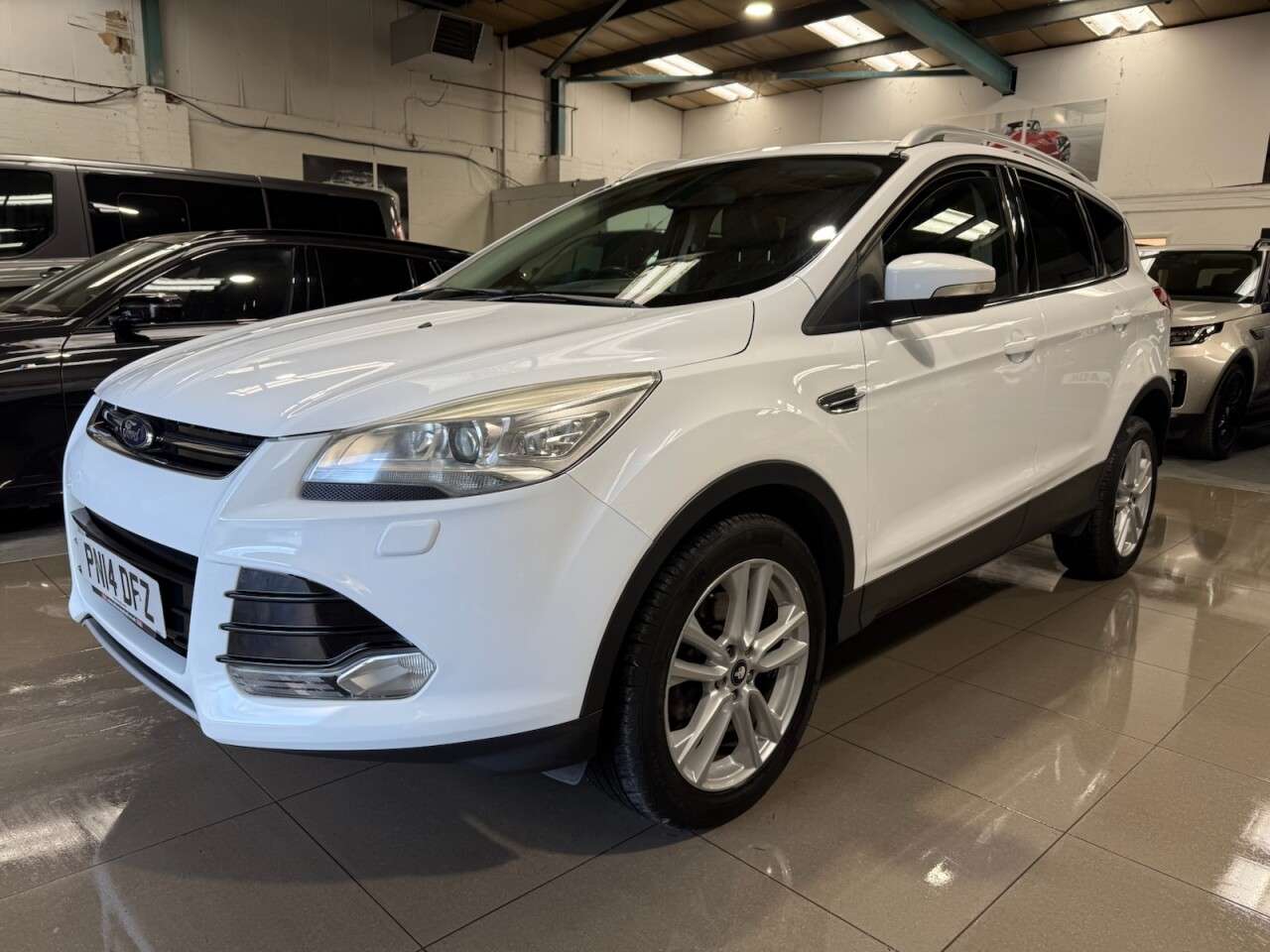 A 2014 FORD KUGA 2.0 TDCi Titanium X SUV 5dr Diesel Manual 2WD Euro 5 (140 ps) A 2014 FORD KUGA 2.0 TDCi Titanium X SUV 5dr Diesel Manual 2WD Euro 5 (140 ps)
