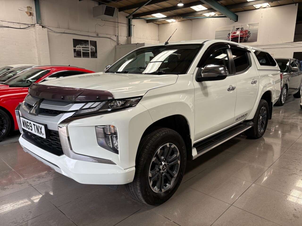 A 2019 MITSUBISHI L200 2.2 DI-D DC Warrior Pickup Double Cab 4dr Diesel Auto 4WD Euro 6 (s/s) (150 A 2019 MITSUBISHI L200 2.2 DI-D DC Warrior Pickup Double Cab 4dr Diesel Auto 4WD Euro 6 (s/s) (150