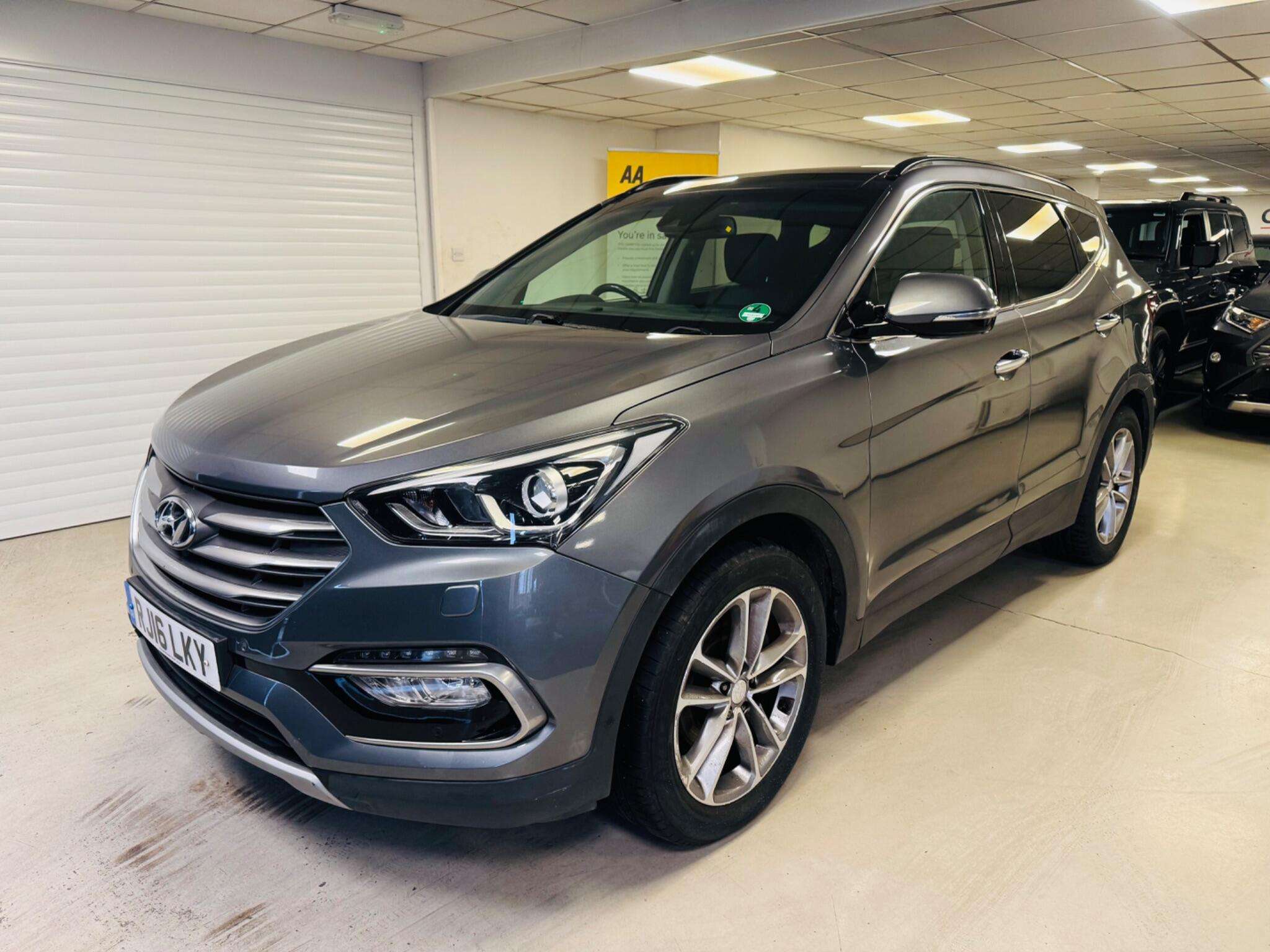 A 2016 HYUNDAI SANTA FE 2.2 CRDi Blue Drive Premium SE Auto 4WD Euro 6 (s/s) 5dr (7 Seat) A 2016 HYUNDAI SANTA FE 2.2 CRDi Blue Drive Premium SE Auto 4WD Euro 6 (s/s) 5dr (7 Seat)