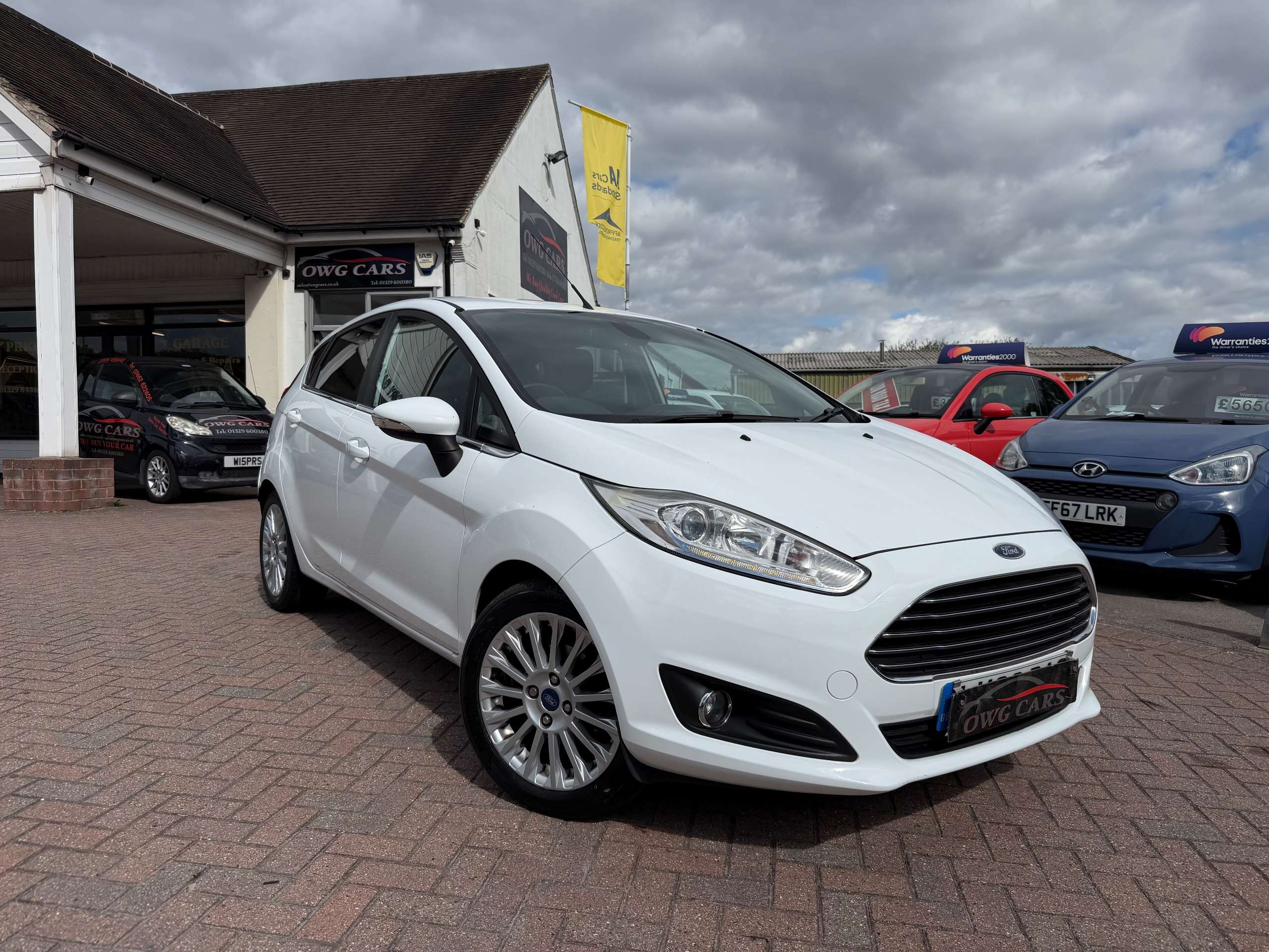 A 2013 FORD FIESTA 1.0T EcoBoost Titanium Hatchback 5dr Petrol Manual Euro 5 (s/s) (100 ps) A 2013 FORD FIESTA 1.0T EcoBoost Titanium Hatchback 5dr Petrol Manual Euro 5 (s/s) (100 ps)