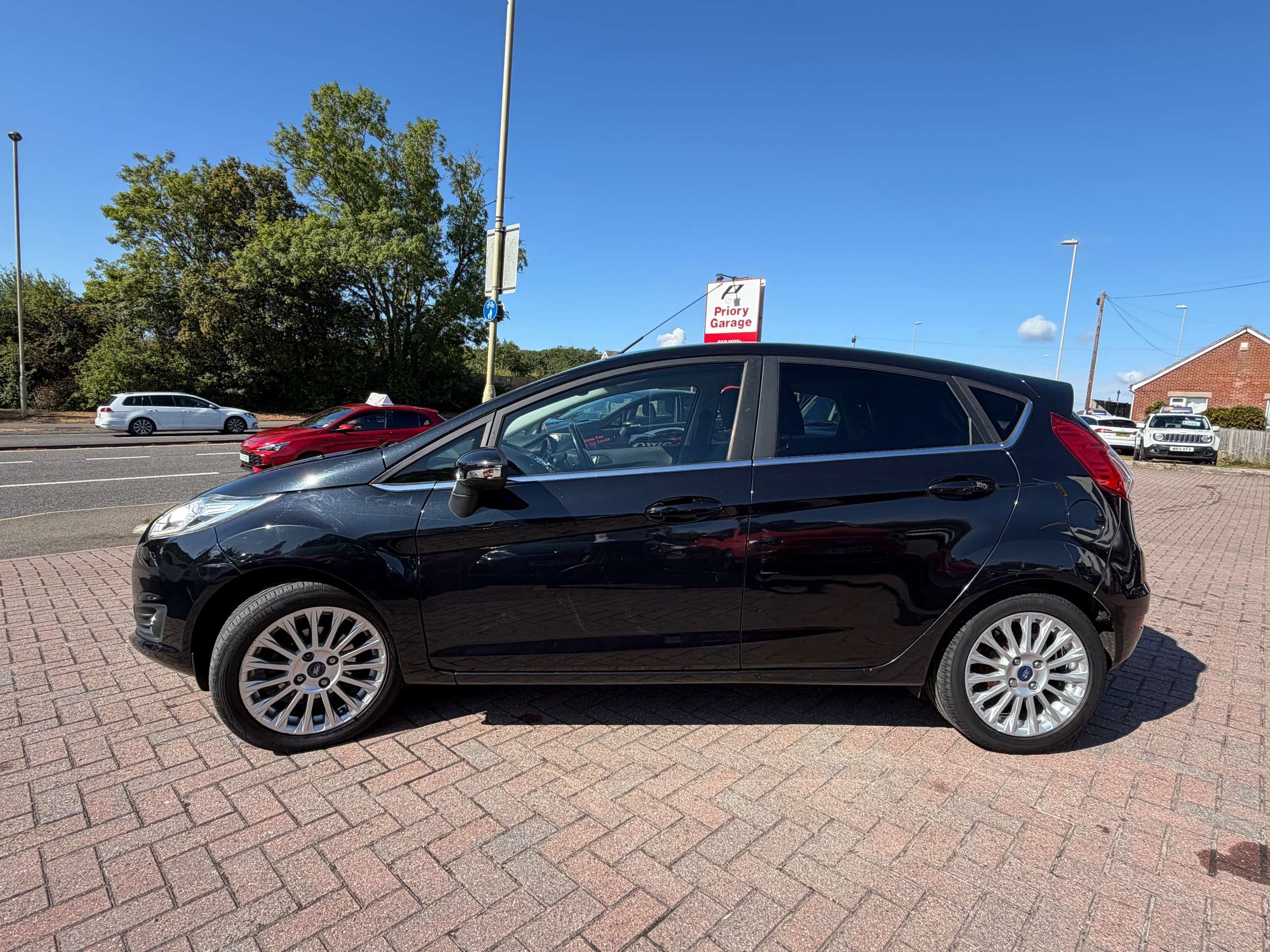 A 2014 FORD FIESTA 1.0 Titanium Hatchback 5dr Petrol Manual Euro 5 (s/s) (80 ps) A 2014 FORD FIESTA 1.0 Titanium Hatchback 5dr Petrol Manual Euro 5 (s/s) (80 ps)