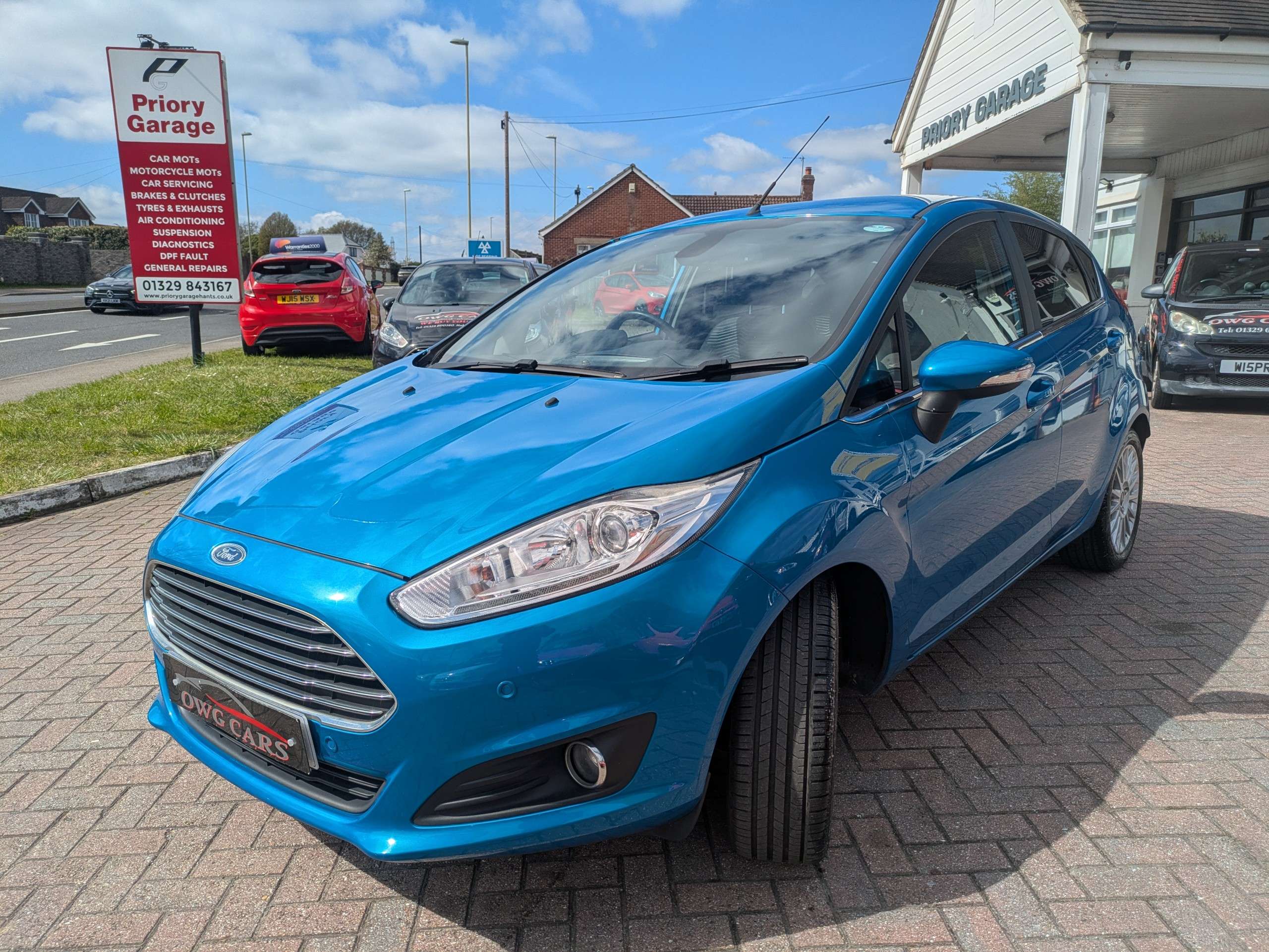 A 2014 FORD FIESTA 1.0T EcoBoost Titanium Hatchback 5dr Petrol Manual Euro 5 (s/s) (100 ps) A 2014 FORD FIESTA 1.0T EcoBoost Titanium Hatchback 5dr Petrol Manual Euro 5 (s/s) (100 ps)