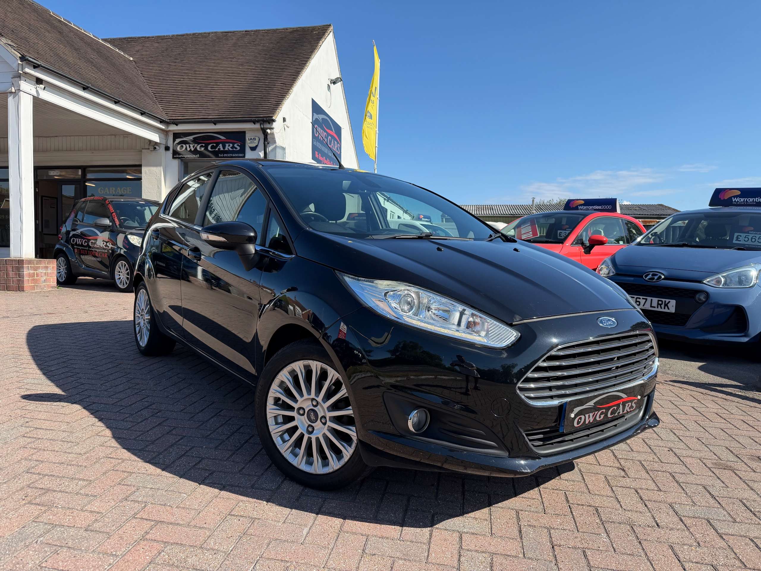 A 2014 FORD FIESTA 1.0 Titanium Hatchback 5dr Petrol Manual Euro 5 (s/s) (80 ps) A 2014 FORD FIESTA 1.0 Titanium Hatchback 5dr Petrol Manual Euro 5 (s/s) (80 ps)