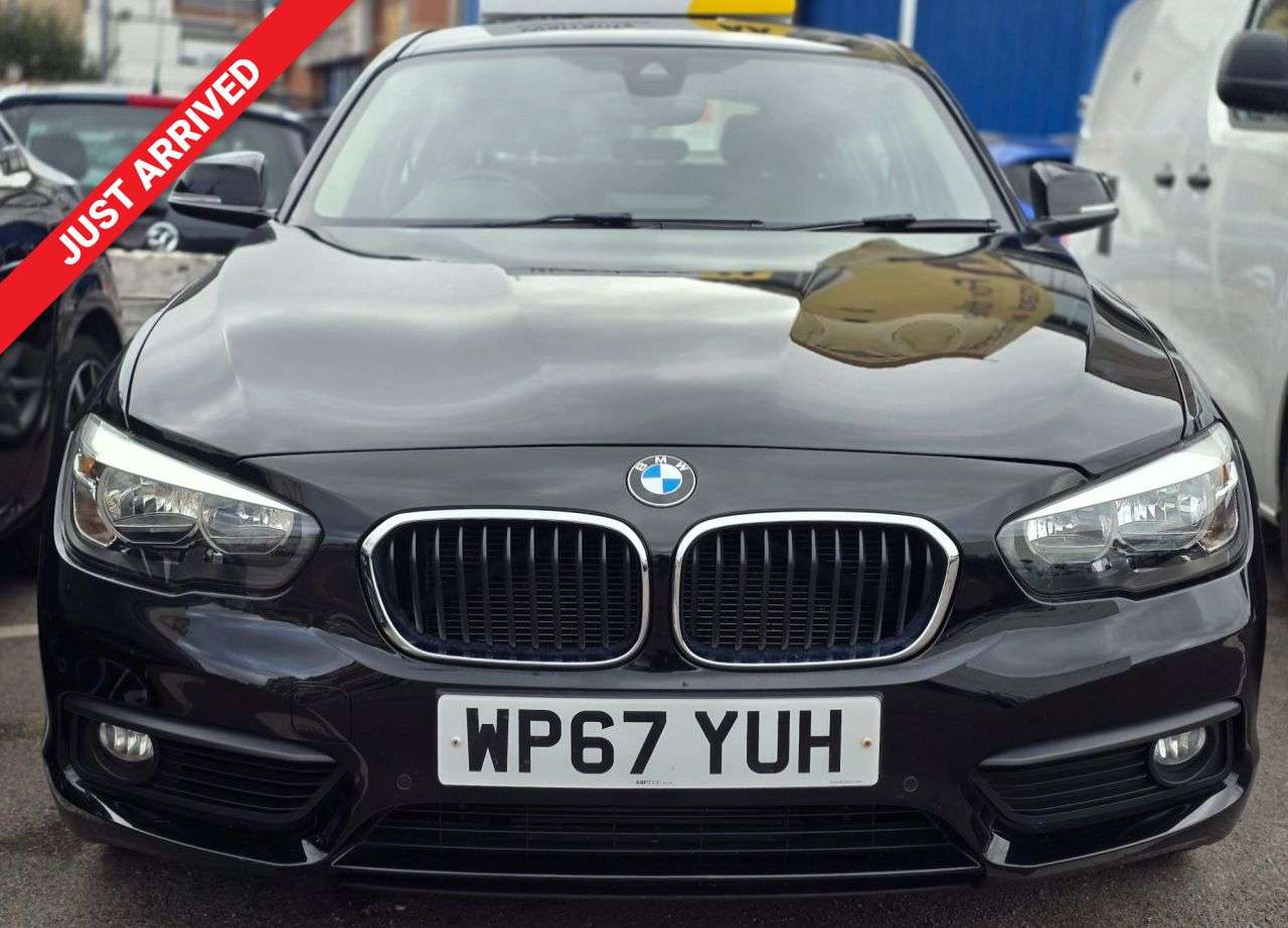 A 2018 BMW 1 SERIES 1.5 118i SE Hatchback 5dr Petrol Auto Euro 6 (s/s) (136 ps) FRONT AND REAR A 2018 BMW 1 SERIES 1.5 118i SE Hatchback 5dr Petrol Auto Euro 6 (s/s) (136 ps) FRONT AND REAR