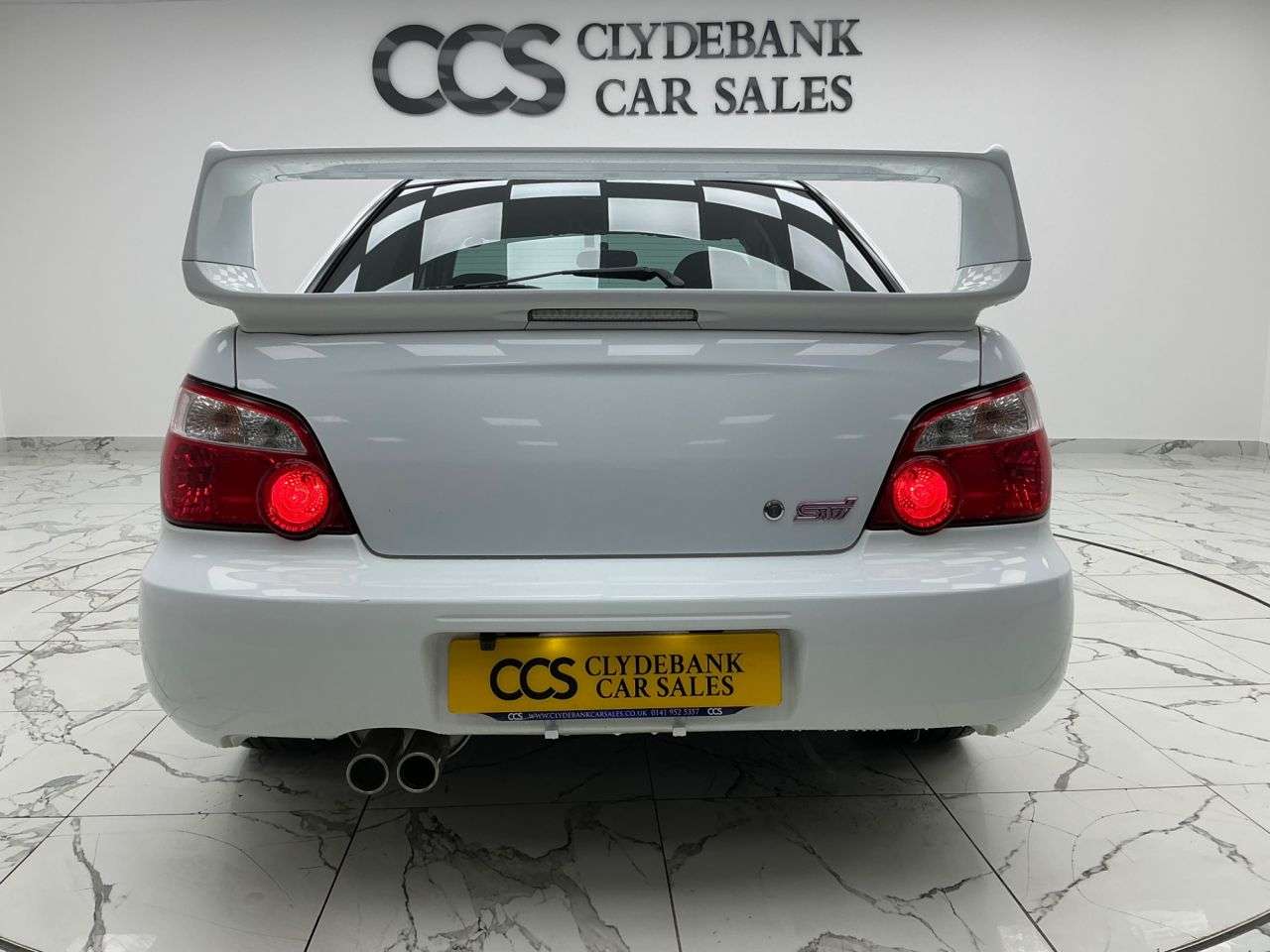 A 2003 SUBARU IMPREZA 2.5 WRX STI Type UK Saloon 4dr Petrol Manual (257 g/km, 278 bhp) Reverse Ca A 2003 SUBARU IMPREZA 2.5 WRX STI Type UK Saloon 4dr Petrol Manual (257 g/km, 278 bhp) Reverse Ca