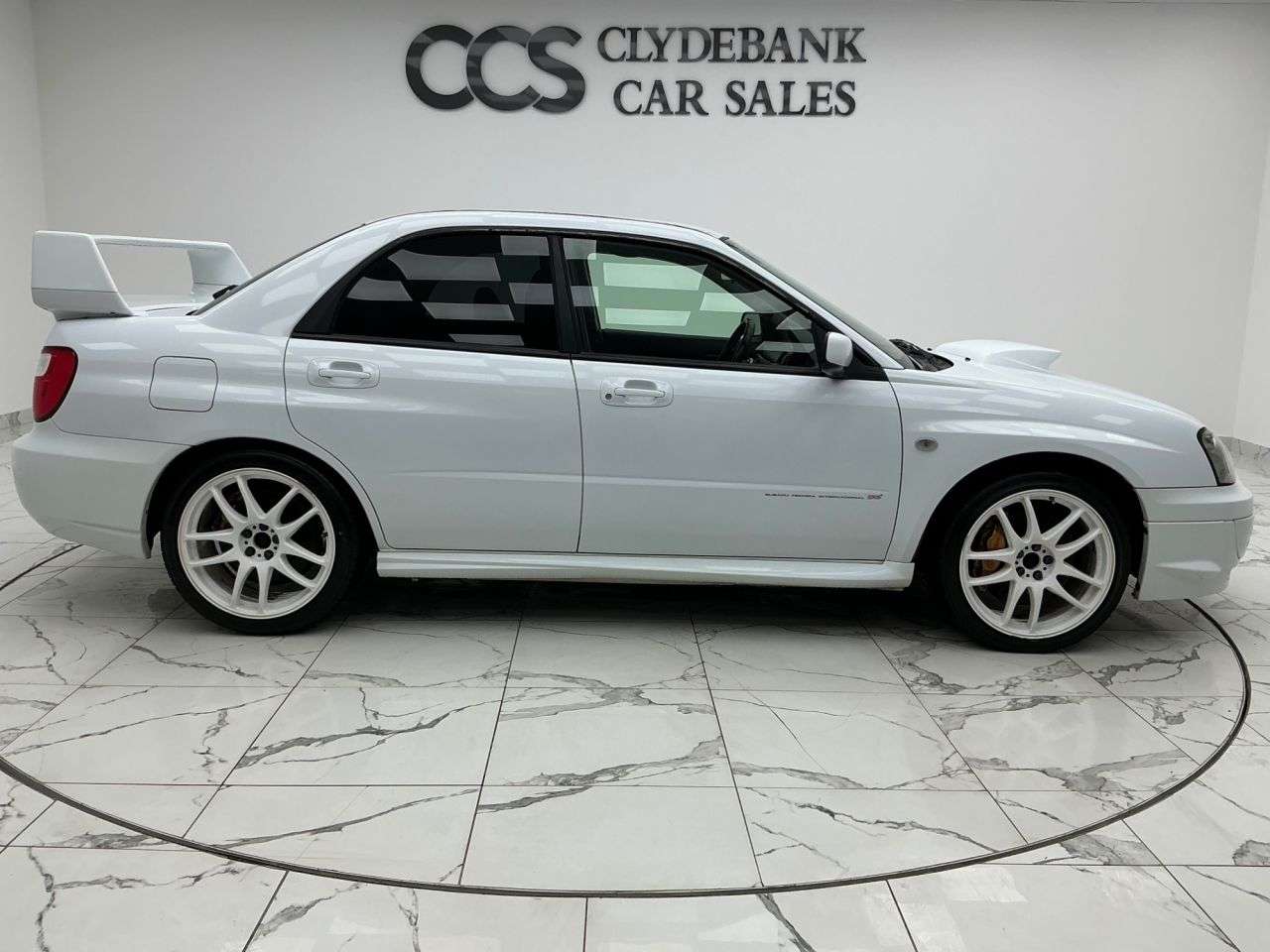 A 2003 SUBARU IMPREZA 2.5 WRX STI Type UK Saloon 4dr Petrol Manual (257 g/km, 278 bhp) Reverse Ca A 2003 SUBARU IMPREZA 2.5 WRX STI Type UK Saloon 4dr Petrol Manual (257 g/km, 278 bhp) Reverse Ca