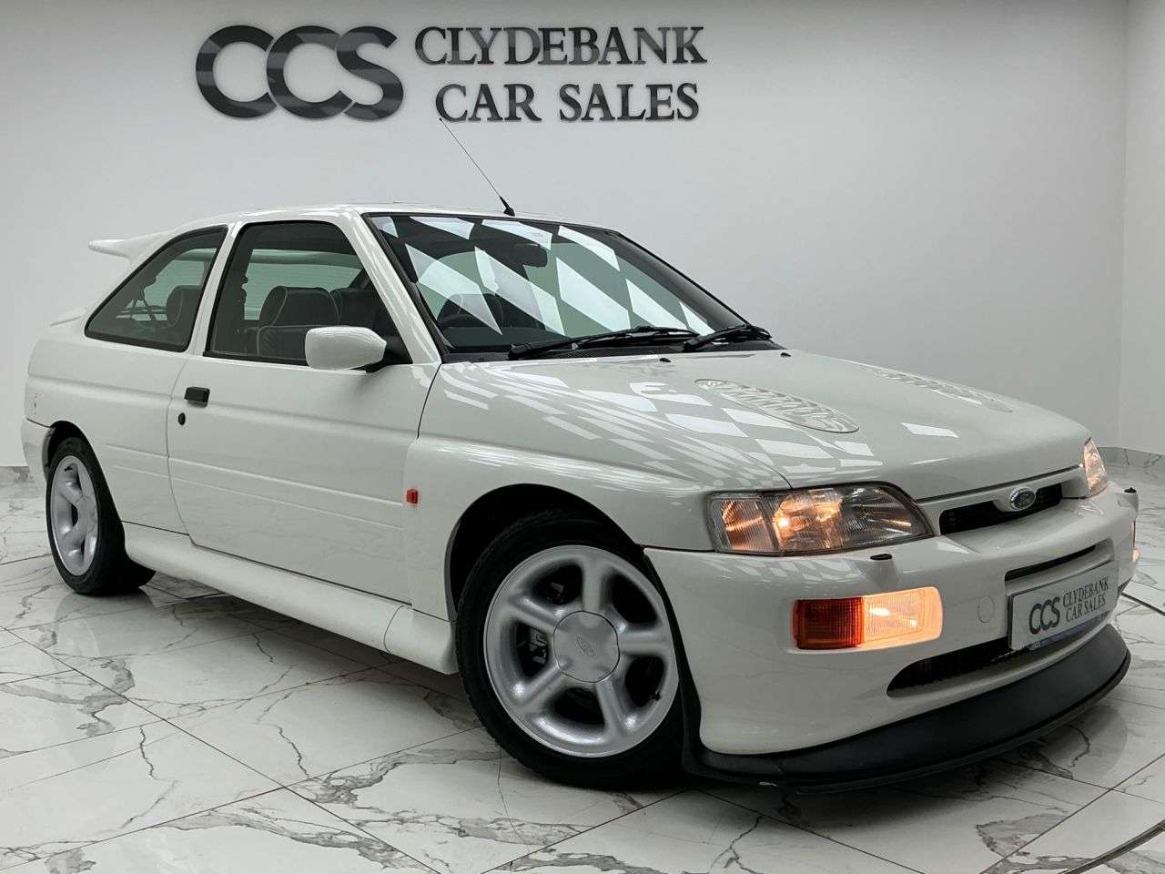 A 1992 FORD ESCORT 2.0 RS COSWORTH BIG TURBO 3 Keys, Folder Of Service History, A 1992 FORD ESCORT 2.0 RS COSWORTH BIG TURBO 3 Keys, Folder Of Service History,