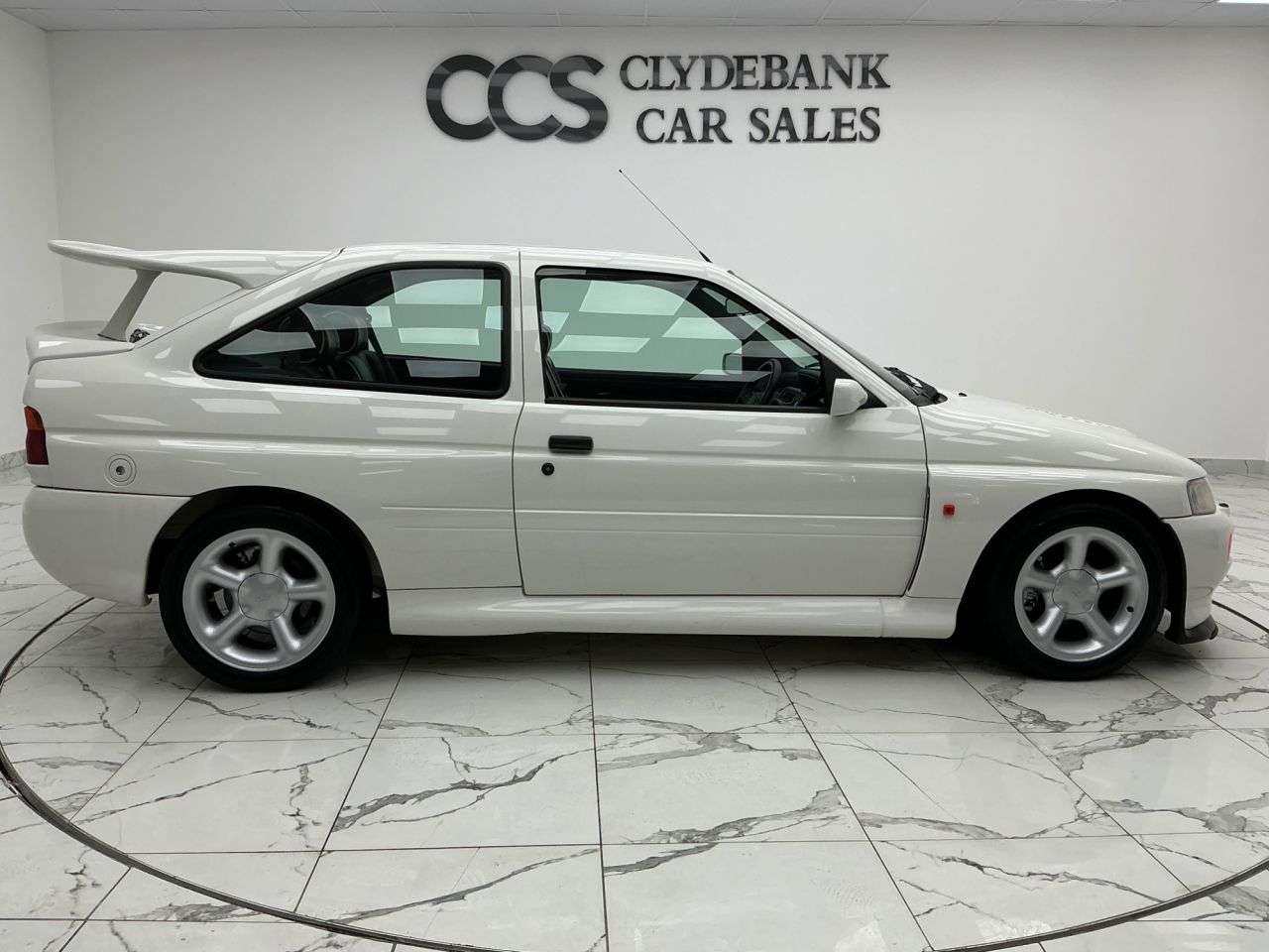 A 1992 FORD ESCORT 2.0 RS COSWORTH BIG TURBO 3 Keys, Folder Of Service History, A 1992 FORD ESCORT 2.0 RS COSWORTH BIG TURBO 3 Keys, Folder Of Service History,