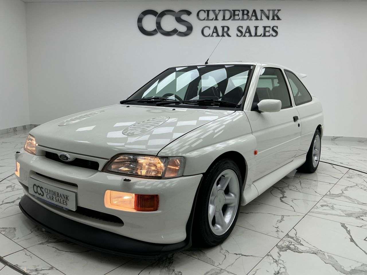 A 1992 FORD ESCORT 2.0 RS COSWORTH BIG TURBO 3 Keys, Folder Of Service History, A 1992 FORD ESCORT 2.0 RS COSWORTH BIG TURBO 3 Keys, Folder Of Service History,