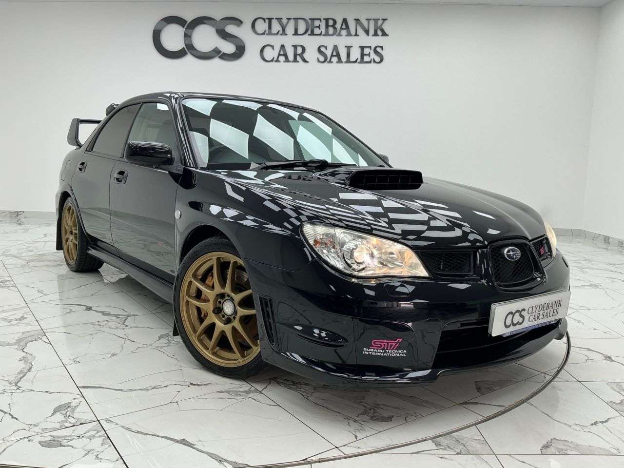 A 2006 SUBARU IMPREZA 2.5 WRX STI Type UK Saloon 4dr Petrol Manual (257 g/km, 278 bhp) 2 Keys A 2006 SUBARU IMPREZA 2.5 WRX STI Type UK Saloon 4dr Petrol Manual (257 g/km, 278 bhp) 2 Keys