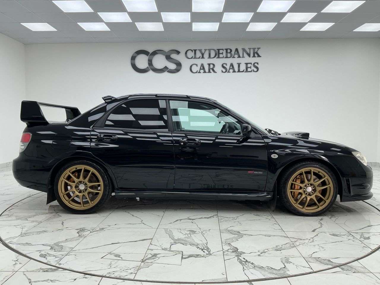 A 2006 SUBARU IMPREZA 2.5 WRX STI Type UK Saloon 4dr Petrol Manual (257 g/km, 278 bhp) 2 Keys A 2006 SUBARU IMPREZA 2.5 WRX STI Type UK Saloon 4dr Petrol Manual (257 g/km, 278 bhp) 2 Keys
