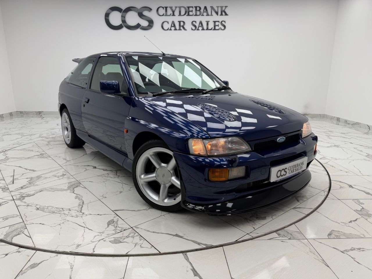 A 1992 FORD ESCORT 2.0 RS COSWORTH 4x4 BIG TURBO 2 keys, Service History A 1992 FORD ESCORT 2.0 RS COSWORTH 4x4 BIG TURBO 2 keys, Service History