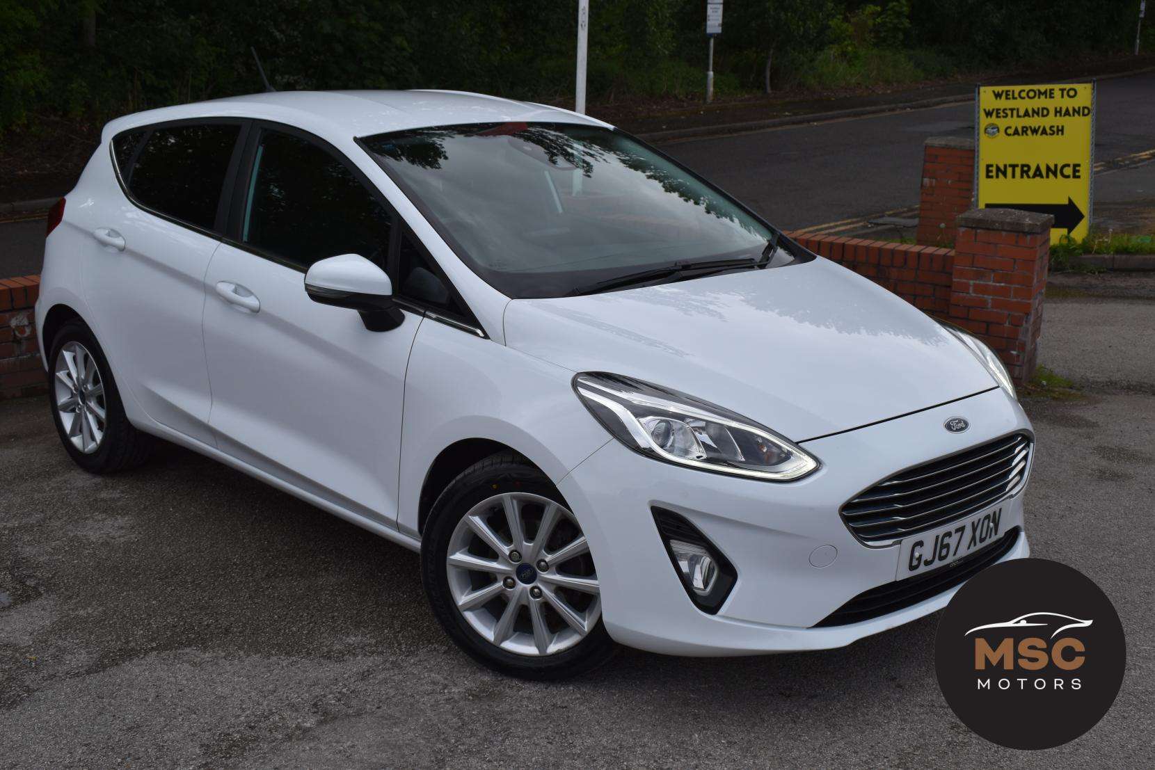 A 2017 FORD FIESTA 1.0T EcoBoost Titanium Hatchback 5dr Petrol Manual Euro 6 (s/s) (125 ps) A 2017 FORD FIESTA 1.0T EcoBoost Titanium Hatchback 5dr Petrol Manual Euro 6 (s/s) (125 ps)