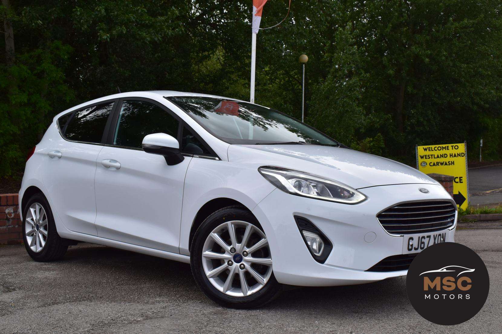 A 2017 FORD FIESTA 1.0T EcoBoost Titanium Hatchback 5dr Petrol Manual Euro 6 (s/s) (125 ps) A 2017 FORD FIESTA 1.0T EcoBoost Titanium Hatchback 5dr Petrol Manual Euro 6 (s/s) (125 ps)