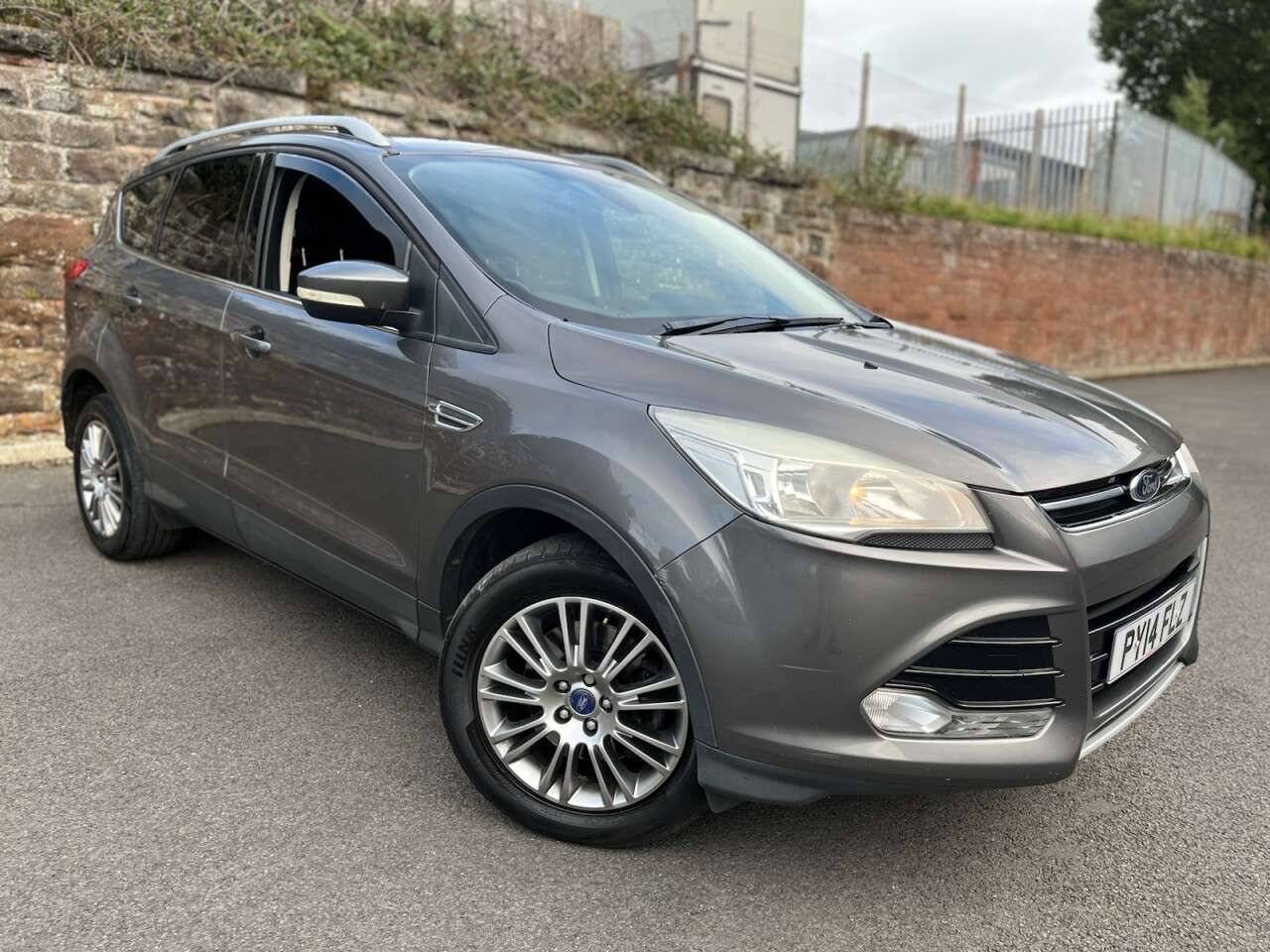 A 2014 FORD KUGA 2.0 TDCi Titanium SUV 5dr Diesel Manual 2WD Euro 5 (140 ps) A 2014 FORD KUGA 2.0 TDCi Titanium SUV 5dr Diesel Manual 2WD Euro 5 (140 ps)