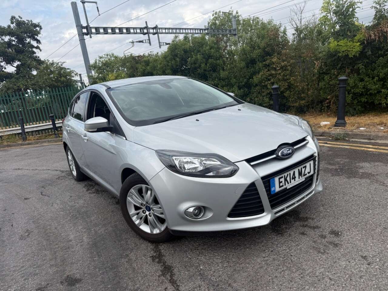 A 2014 FORD FOCUS 1.0T EcoBoost Titanium Navigator Hatchback 5dr Petrol Manual Euro 5 (s/s) ( A 2014 FORD FOCUS 1.0T EcoBoost Titanium Navigator Hatchback 5dr Petrol Manual Euro 5 (s/s) (