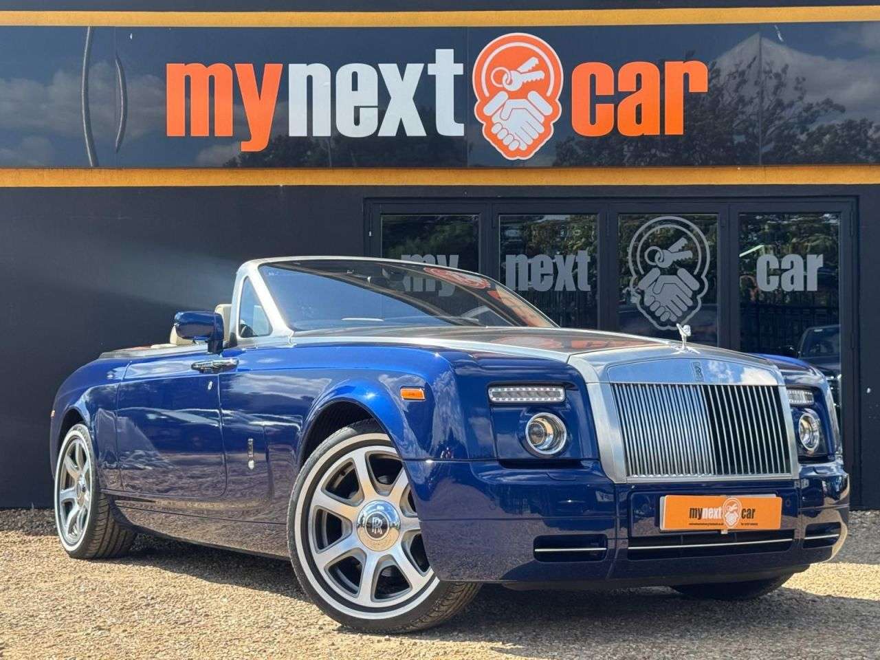 A 2007 ROLLS-ROYCE PHANTOM 6.7 V12 Drophead Coupe 2dr Petrol Auto Euro 4 (453 bhp) METROPOLITAN BLUE + A 2007 ROLLS-ROYCE PHANTOM 6.7 V12 Drophead Coupe 2dr Petrol Auto Euro 4 (453 bhp) METROPOLITAN BLUE +