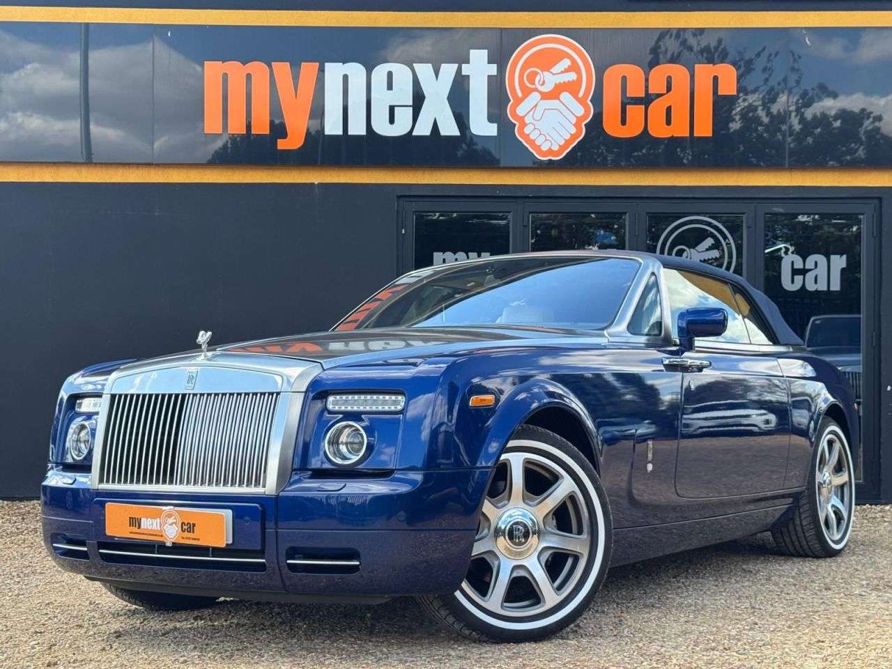 A 2007 ROLLS-ROYCE PHANTOM 6.7 V12 Drophead Coupe 2dr Petrol Auto Euro 4 (453 bhp) METROPOLITAN BLUE + A 2007 ROLLS-ROYCE PHANTOM 6.7 V12 Drophead Coupe 2dr Petrol Auto Euro 4 (453 bhp) METROPOLITAN BLUE +