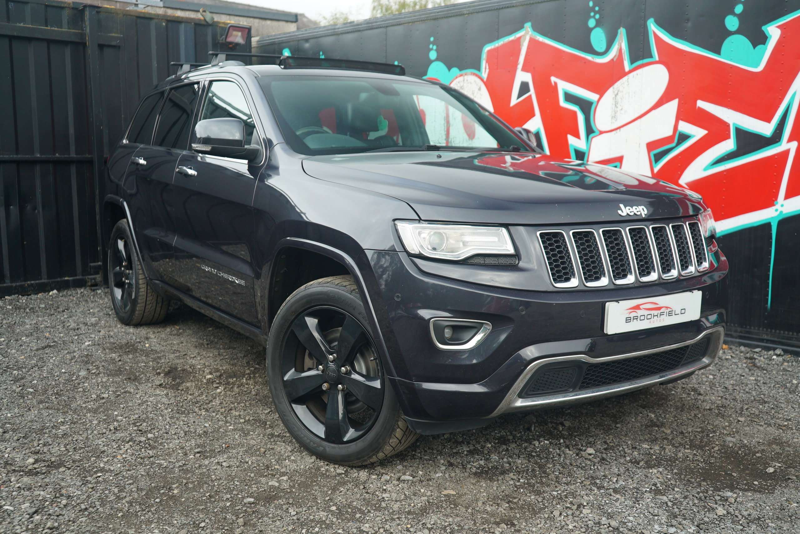 A 2013 JEEP GRAND CHEROKEE 3.0 V6 CRD Overland SUV 5dr Diesel Auto 4WD Euro 5 (247 bhp) A 2013 JEEP GRAND CHEROKEE 3.0 V6 CRD Overland SUV 5dr Diesel Auto 4WD Euro 5 (247 bhp)