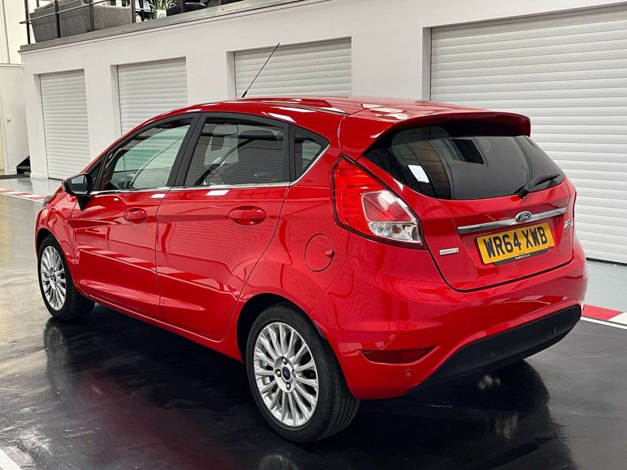 A 2014 FORD FIESTA 1.0T EcoBoost Titanium Hatchback 5dr Petrol Manual Euro 5 (s/s) (100 ps) A 2014 FORD FIESTA 1.0T EcoBoost Titanium Hatchback 5dr Petrol Manual Euro 5 (s/s) (100 ps)