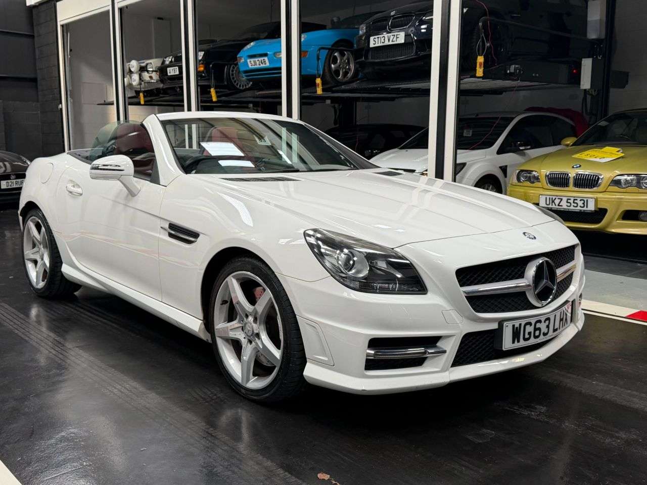 A 2013 MERCEDES-BENZ SLK 1.8 SLK200 AMG Sport Convertible 2dr Petrol G-Tronic+ Euro 5 (s/s) (184 ps) A 2013 MERCEDES-BENZ SLK 1.8 SLK200 AMG Sport Convertible 2dr Petrol G-Tronic+ Euro 5 (s/s) (184 ps)