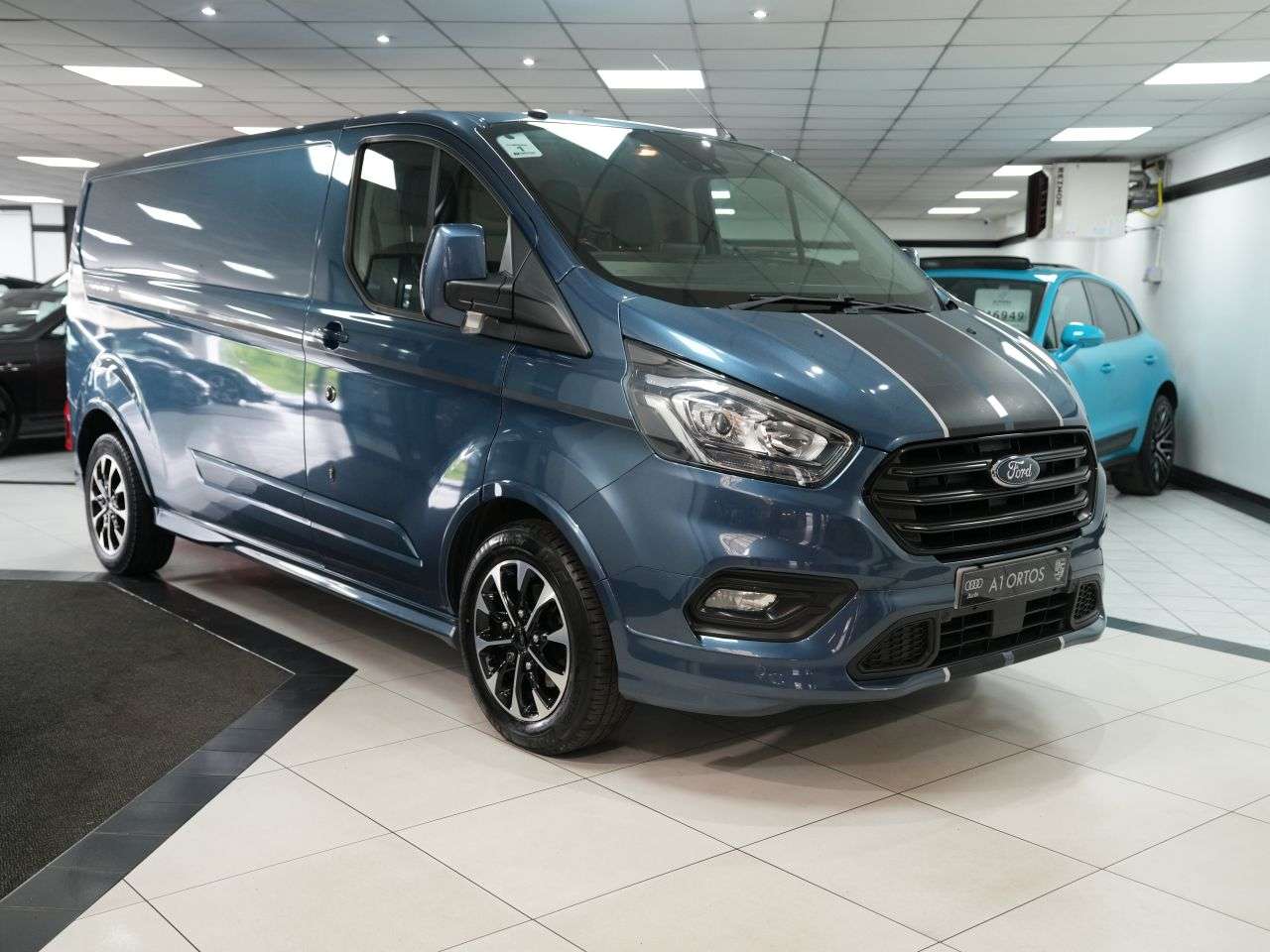 A 2019 FORD TRANSIT CUSTOM 2.0 310 EcoBlue Sport Panel Van 5dr Diesel Manual L2 H1 Euro 6 (170 ps) PLY A 2019 FORD TRANSIT CUSTOM 2.0 310 EcoBlue Sport Panel Van 5dr Diesel Manual L2 H1 Euro 6 (170 ps) PLY