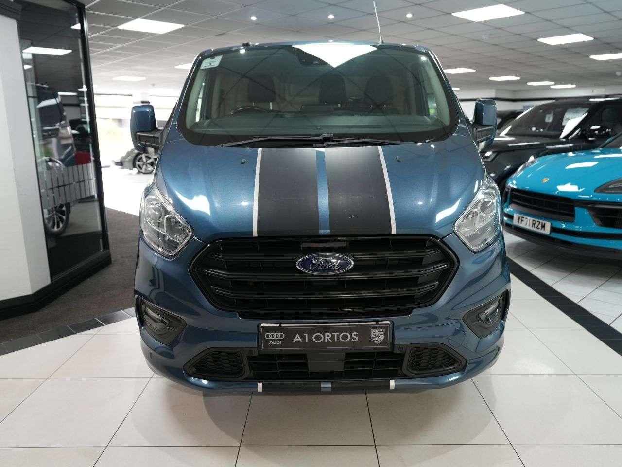 A 2019 FORD TRANSIT CUSTOM 2.0 310 EcoBlue Sport Panel Van 5dr Diesel Manual L2 H1 Euro 6 (170 ps) PLY A 2019 FORD TRANSIT CUSTOM 2.0 310 EcoBlue Sport Panel Van 5dr Diesel Manual L2 H1 Euro 6 (170 ps) PLY