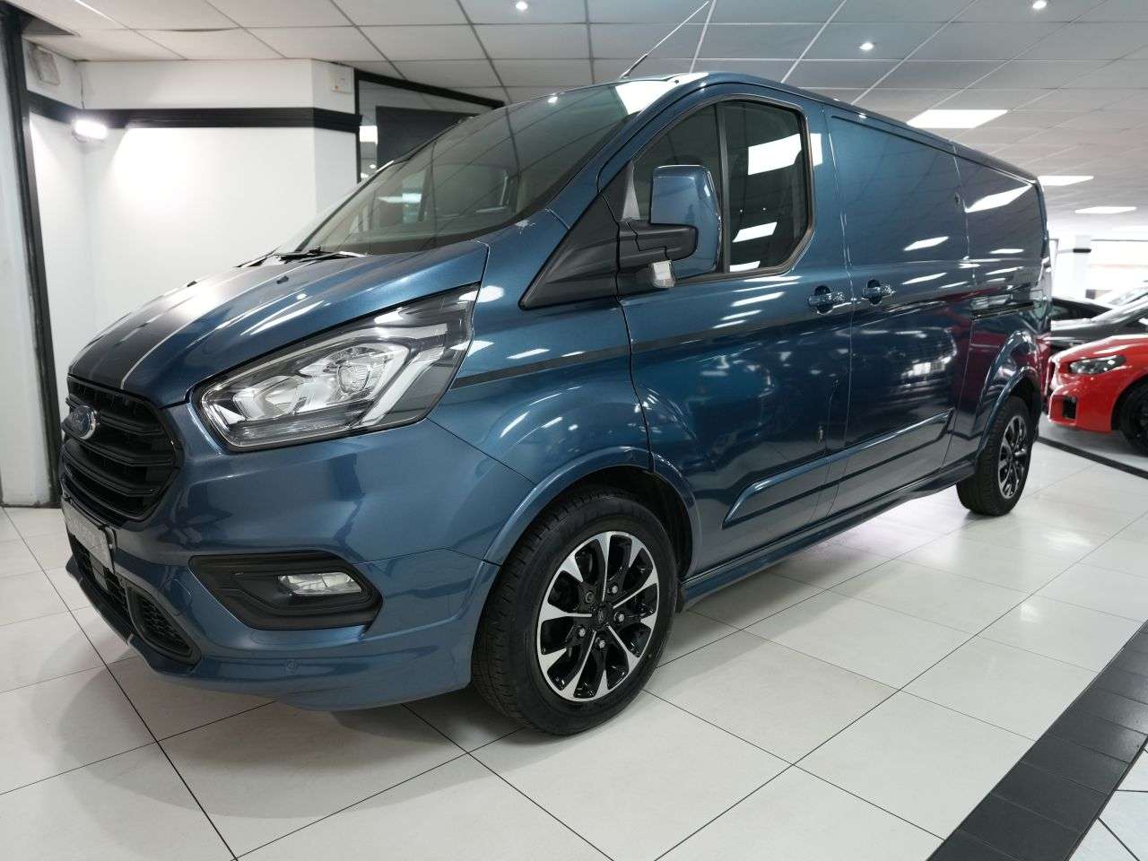 A 2019 FORD TRANSIT CUSTOM 2.0 310 EcoBlue Sport Panel Van 5dr Diesel Manual L2 H1 Euro 6 (170 ps) PLY A 2019 FORD TRANSIT CUSTOM 2.0 310 EcoBlue Sport Panel Van 5dr Diesel Manual L2 H1 Euro 6 (170 ps) PLY